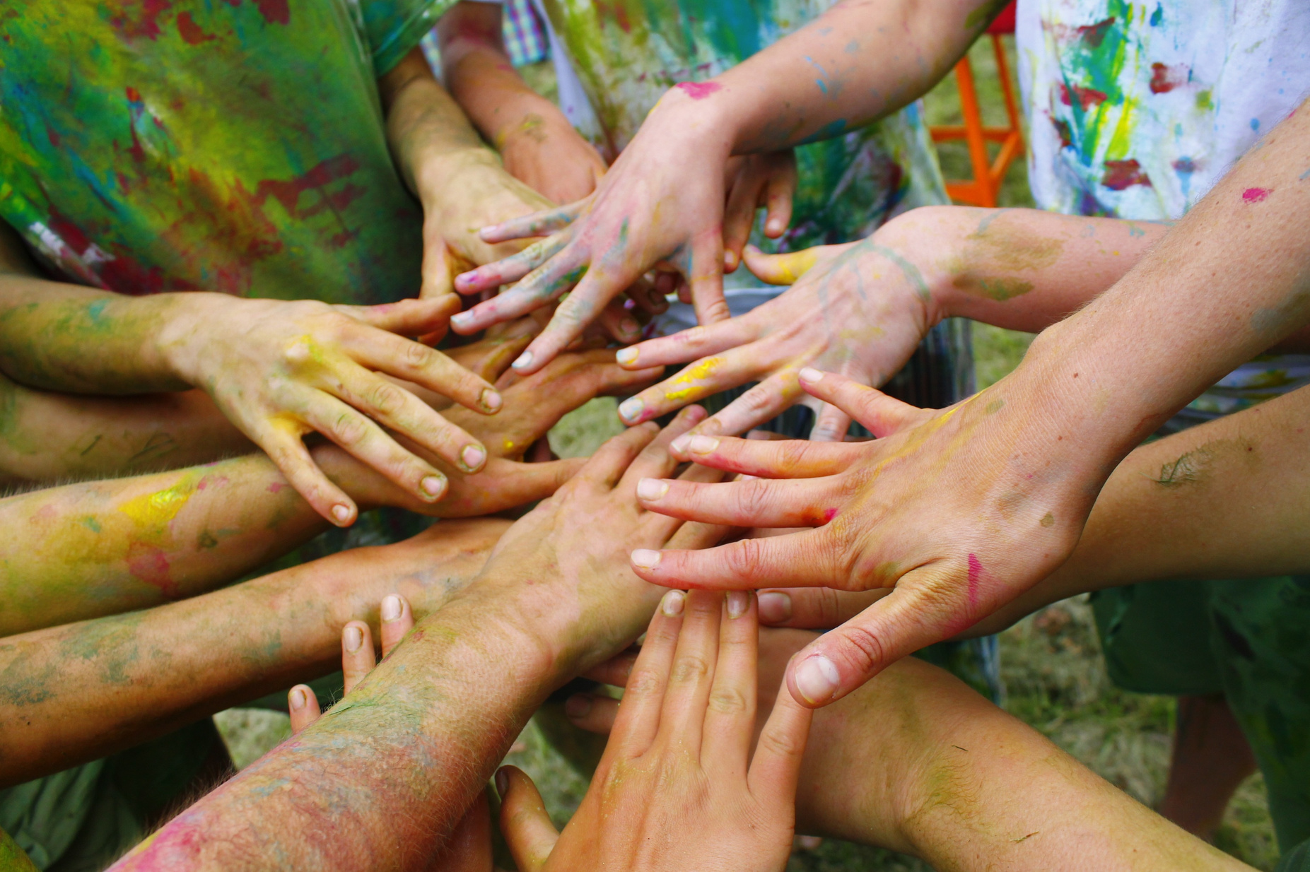 Hands Of Children Painted With Colors